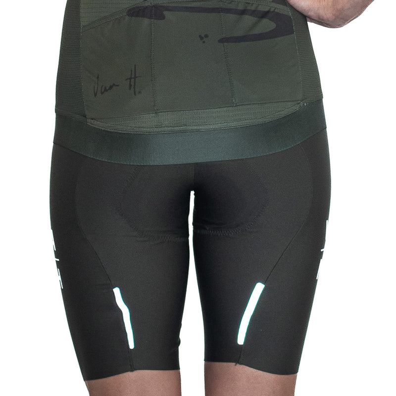 Back View of womens olive Top of the range Tourmalet Cycling bib displaying reflective properties, Front View of womens Black Top of the range Tourmalet Cycling bib, Cycling bib, cycling shorts, cycling tights, premium cycling bib, south Africa, Van H, cycling mens cycling bib, womens cycling bib, elastic interface